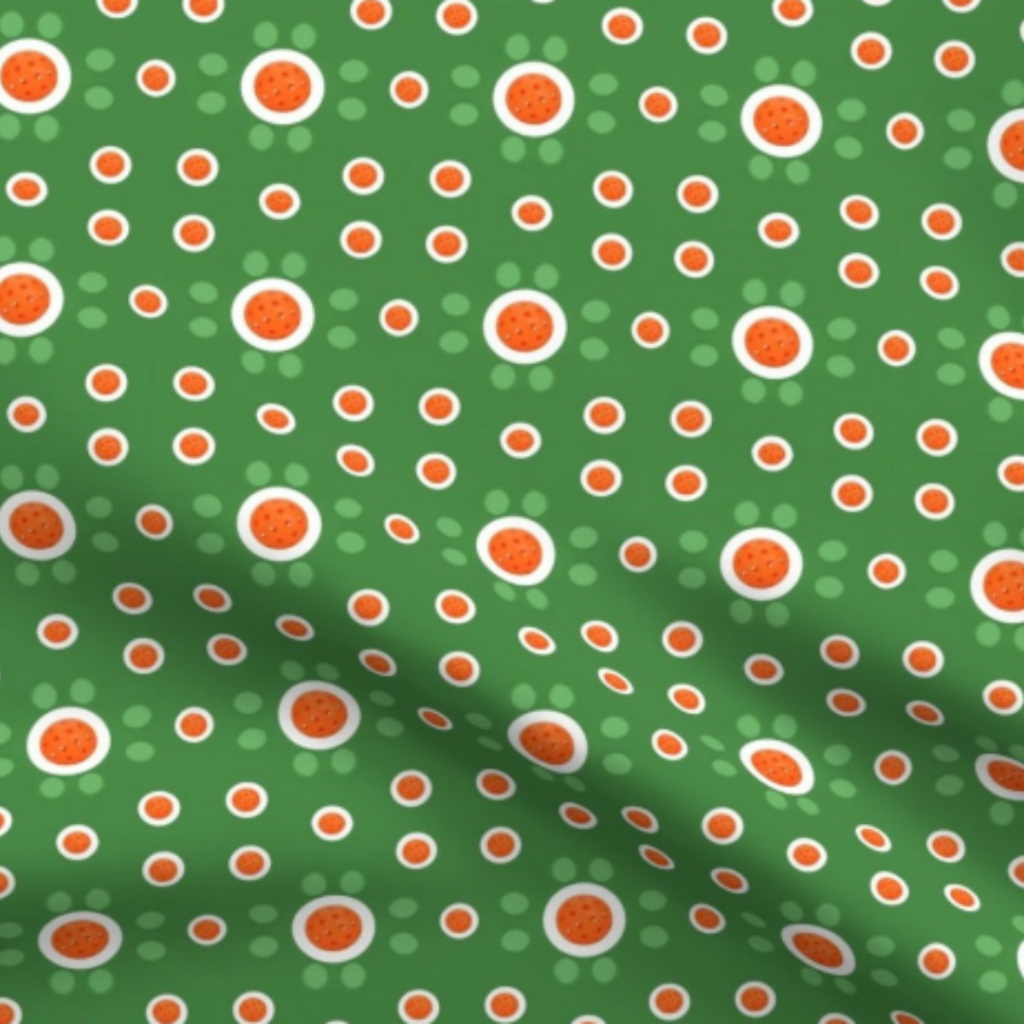 Pickleball Polka Dots Court Green with Orange Pickleballs Fabric by green carbon 2112