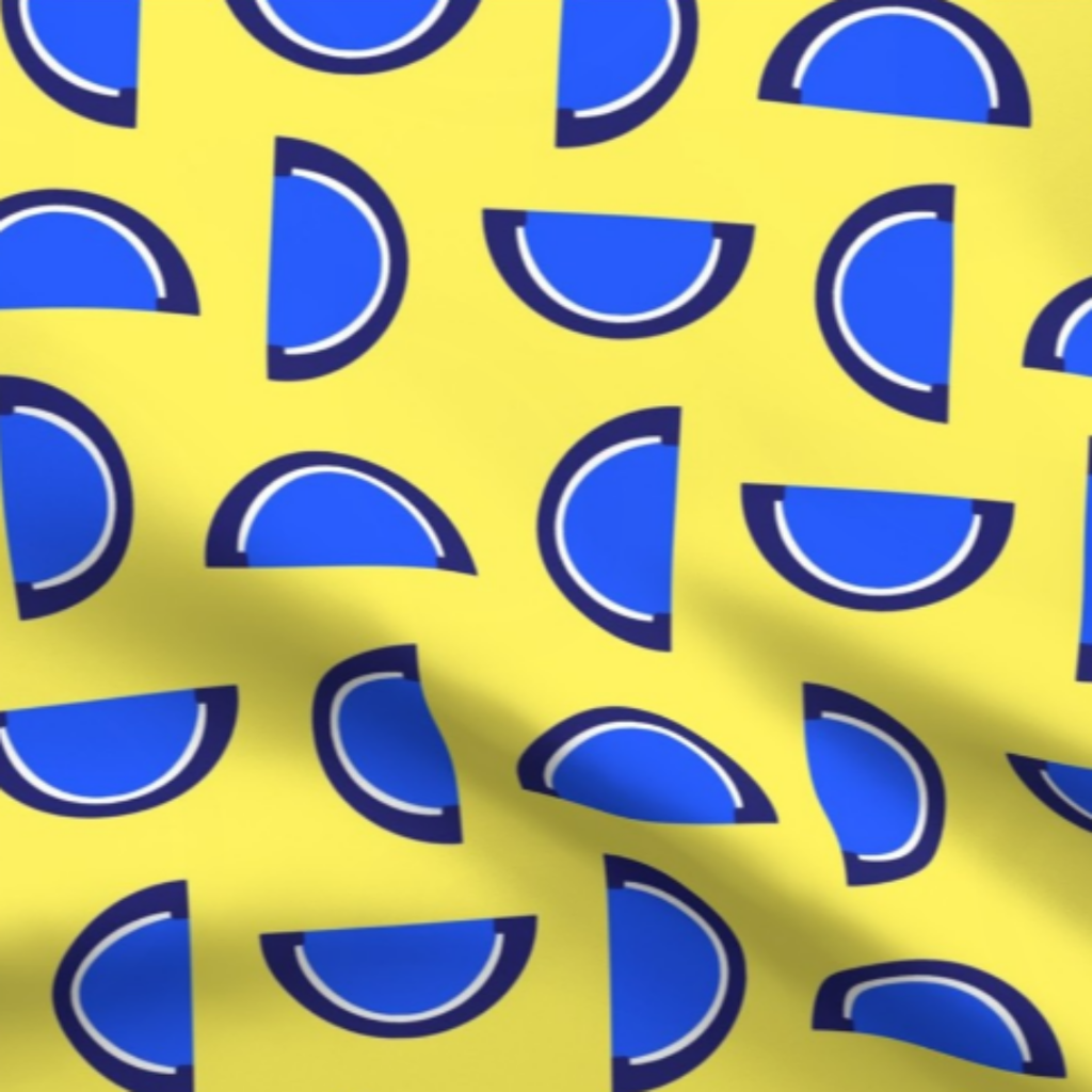 Blue Raspberry Candy Fruit Slices on White on Yellow Fabric