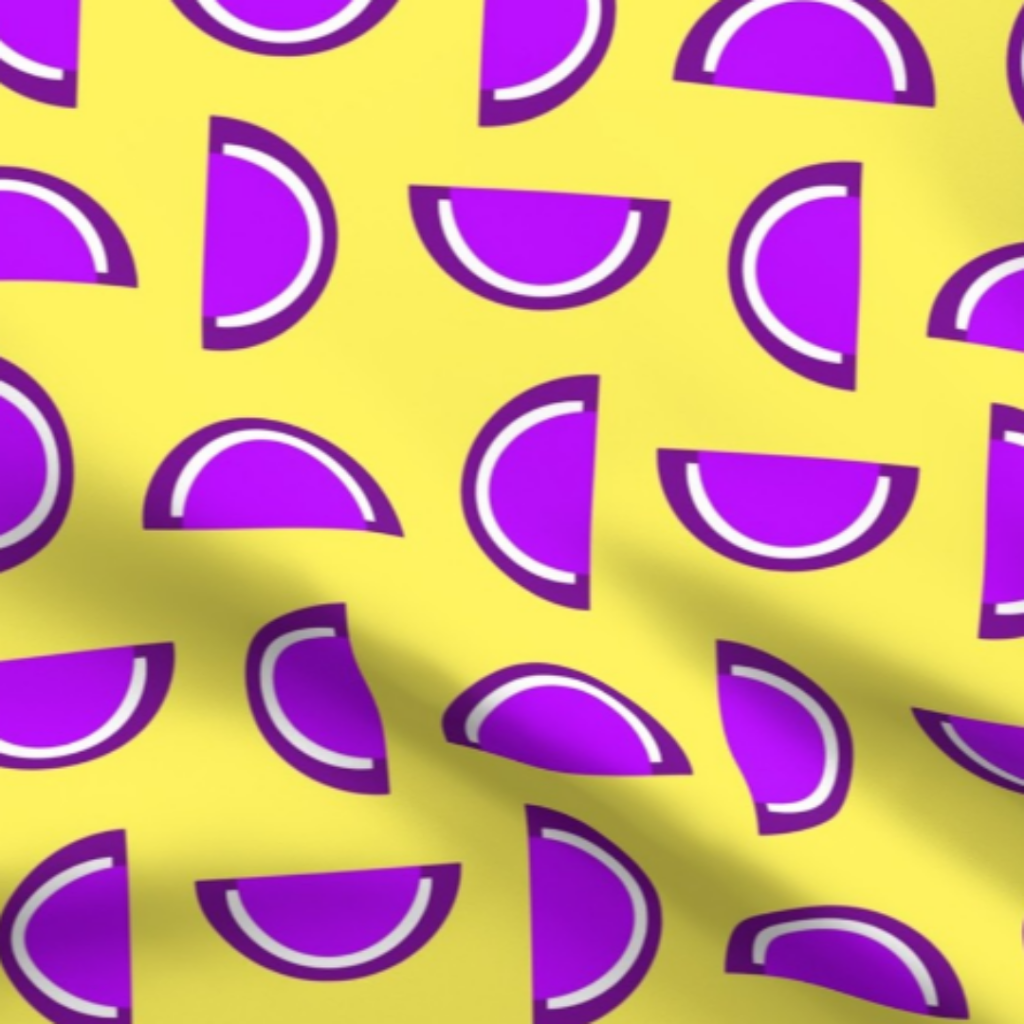 Grape Jelly Candy Fruit Slices on Yellow Fabric