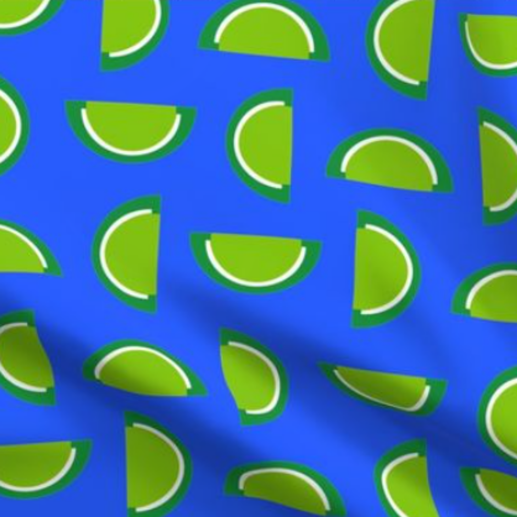 Lime Green Jelly Candy Fruit Slices on Sky Blue