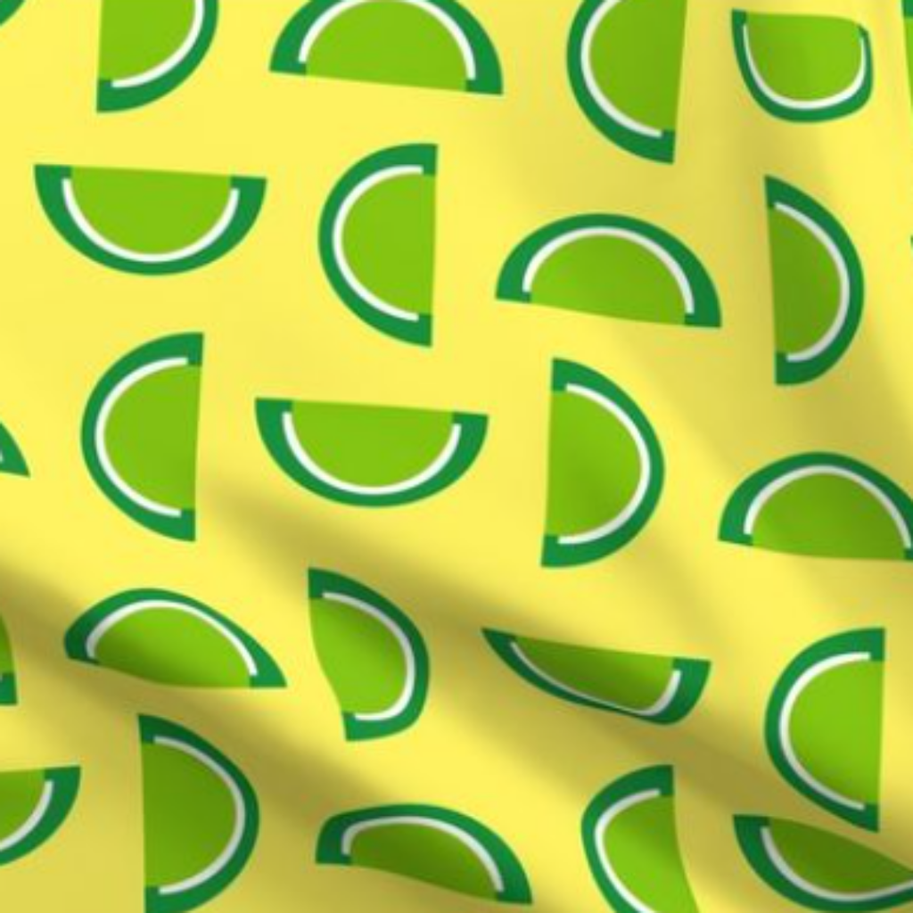 Lime Green Jelly Candy Fruit Slices on Yellow