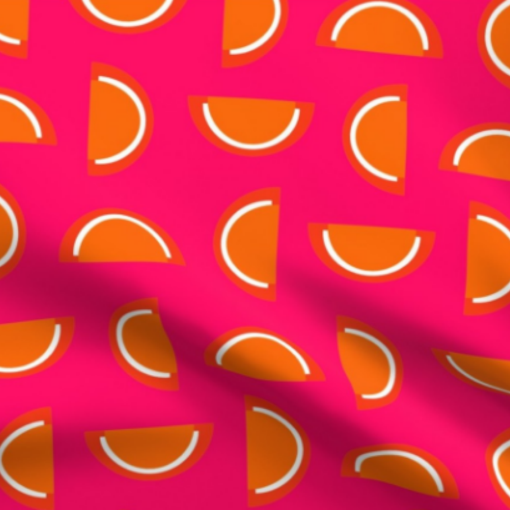 Orange Jelly Candy Fruit Slices on Hot Pink