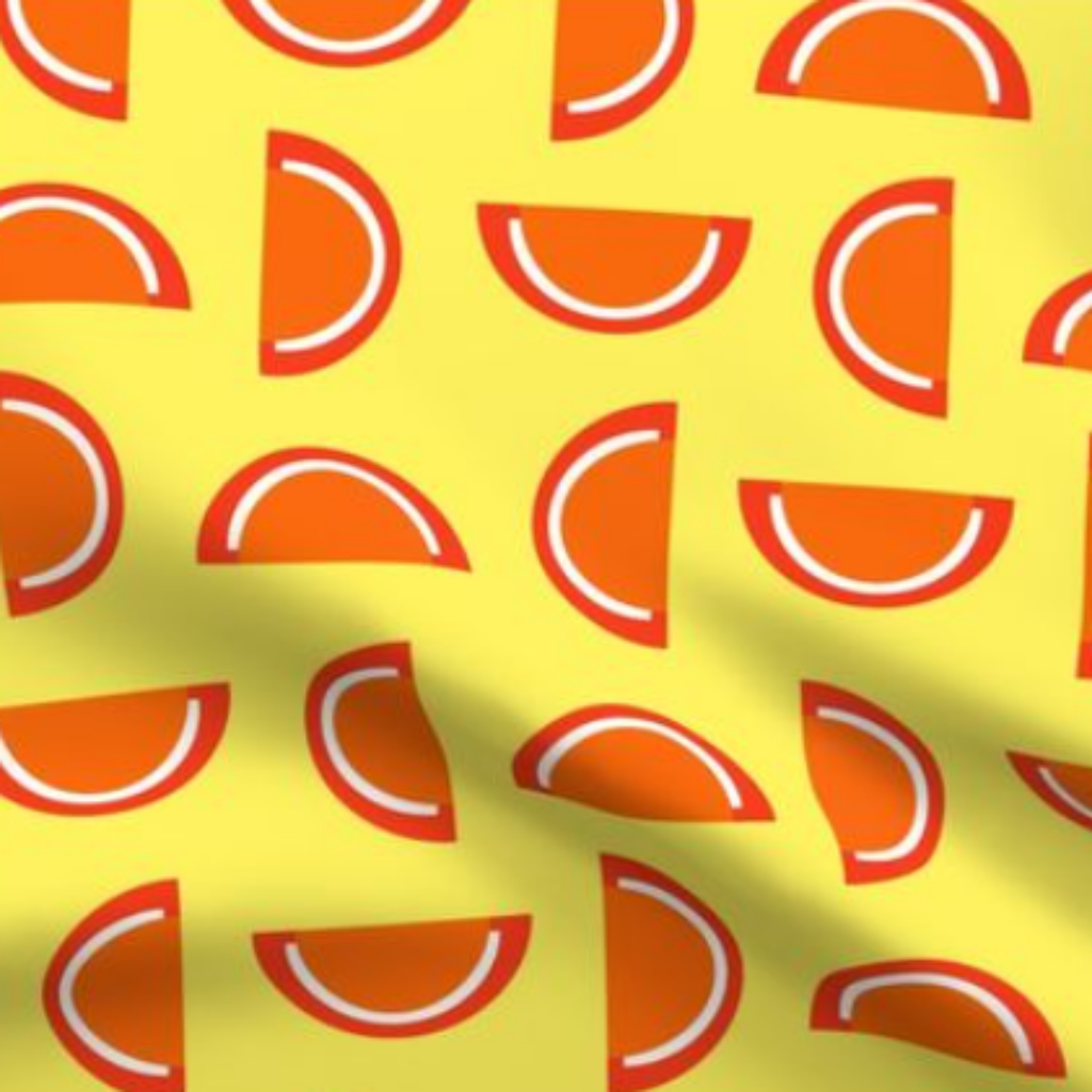 Orange Jelly Candy Fruit Slices on Yellow