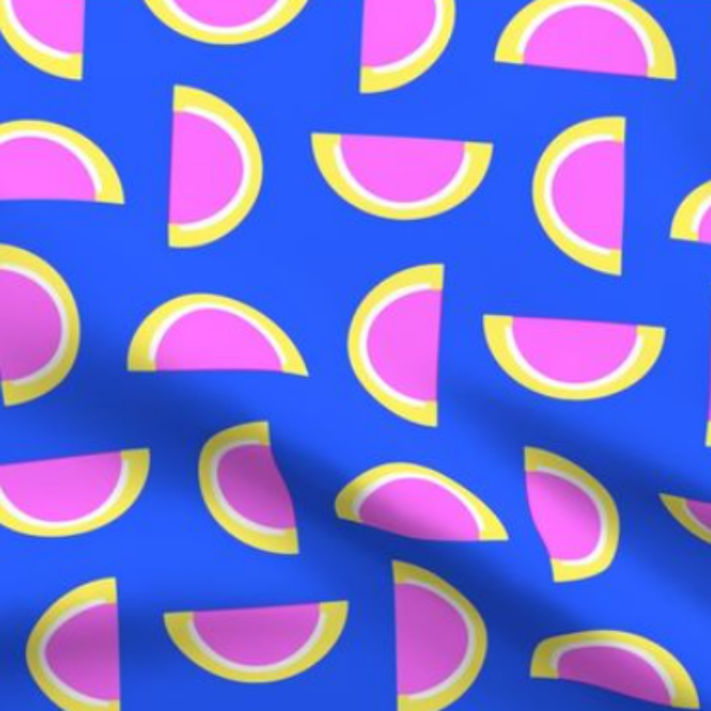 Pink Grapefruit Jelly Candy Fruit Slices on Blue