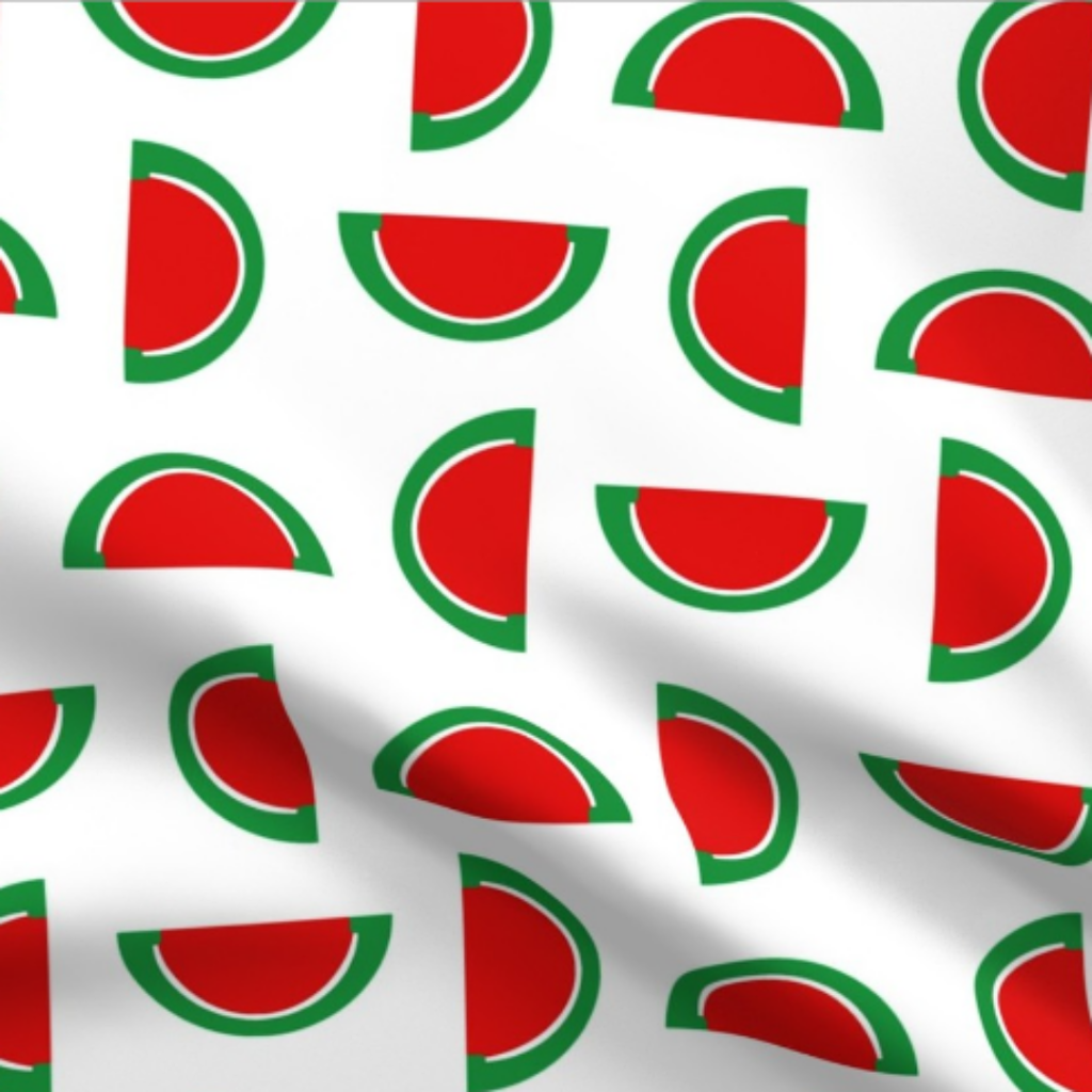 Strawberry Red and Green Jelly Candy Fruit Slices on White Fabric