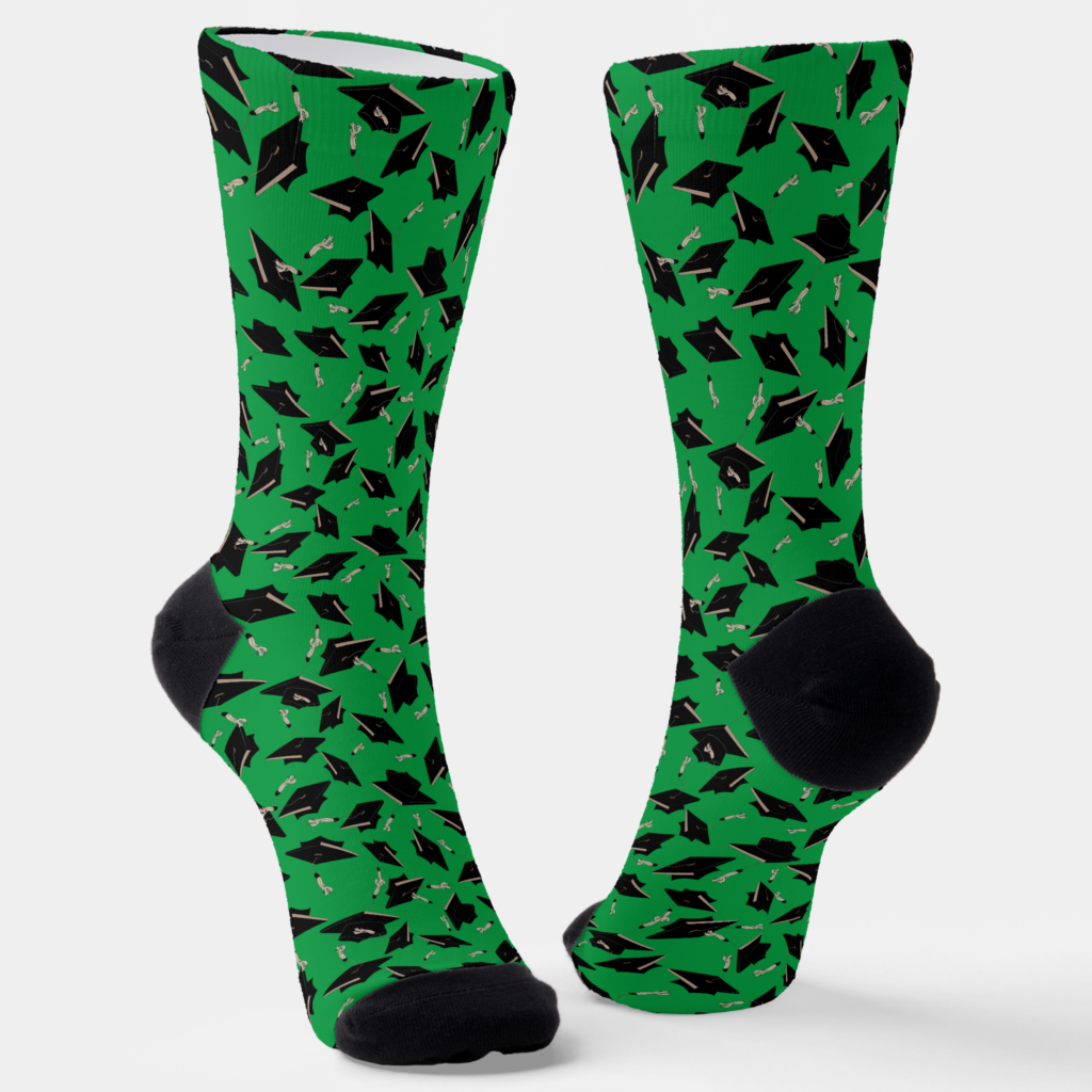 Zazzle Black Graduation Caps Tossed in the Air on Green Socks (Angled)