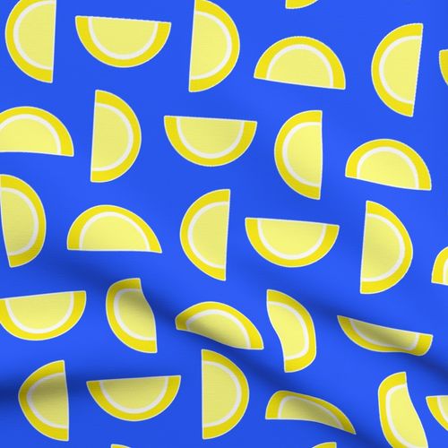 Lemon Yellow Candy Fruit Slices on Sky Blue fabric